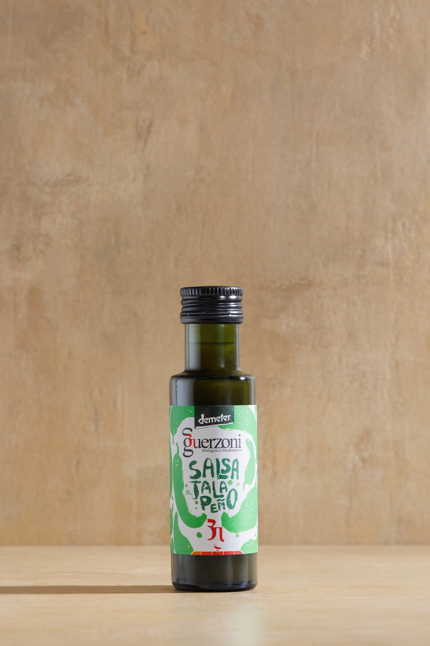 Green Jalapeño Sauce, glass bottle of organic green jalapeño hot sauce, Guerzoni, Modena