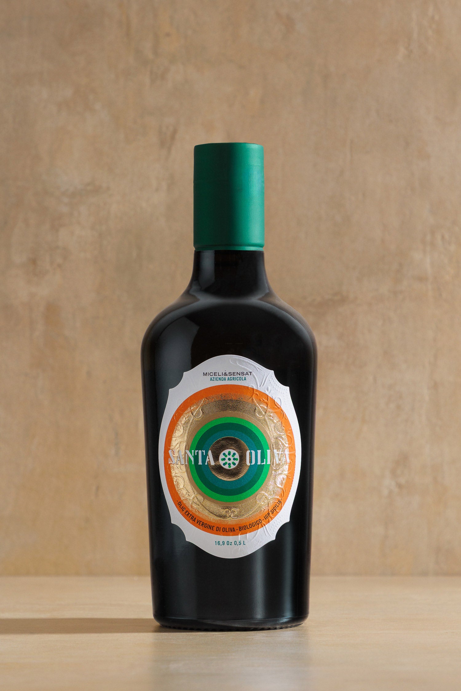 Santa Oliva Organic Extra Virgin Olive Oil, dark glass bottle of single-cultivar Cerasuola EVOO, Miceli & Sensat, Sicily